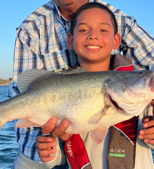 Proud Largemouth Bass catch on O.H. Ivie